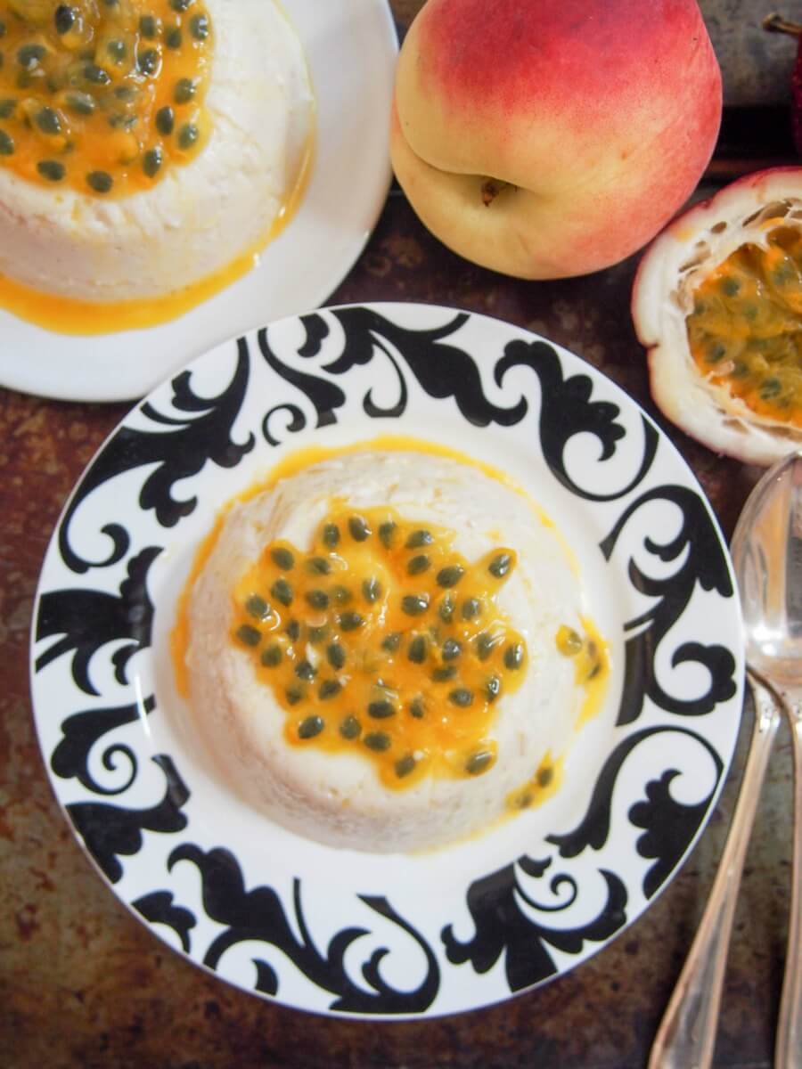 peach panna cotta topped with passion fruit