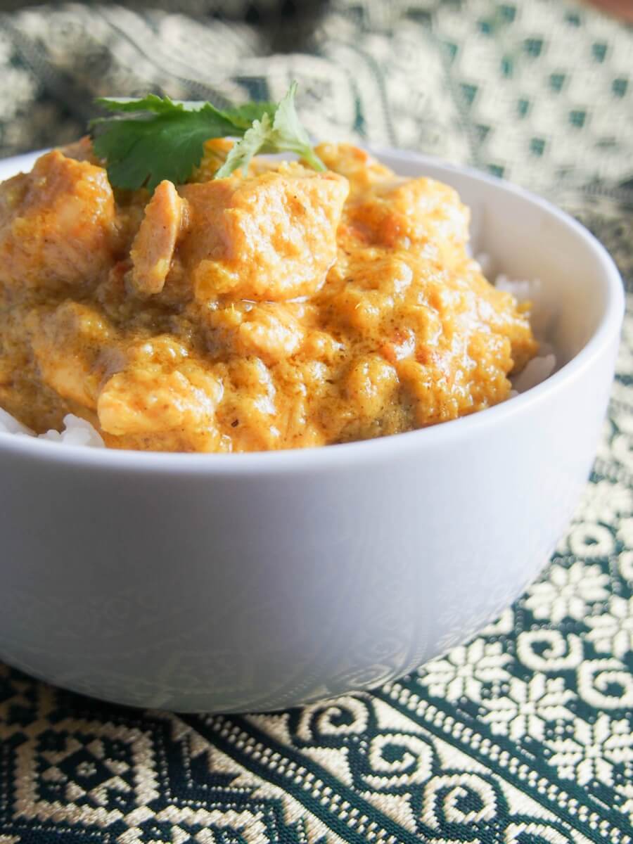 close up view of salmon curry in bowl