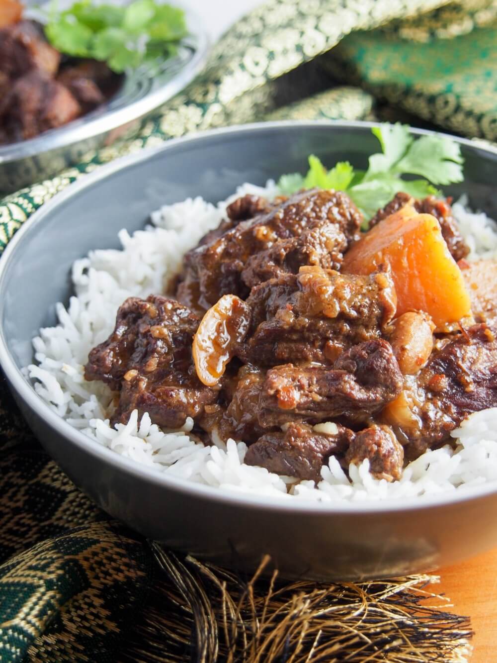 Bowl of slow cooker beef massaman curry