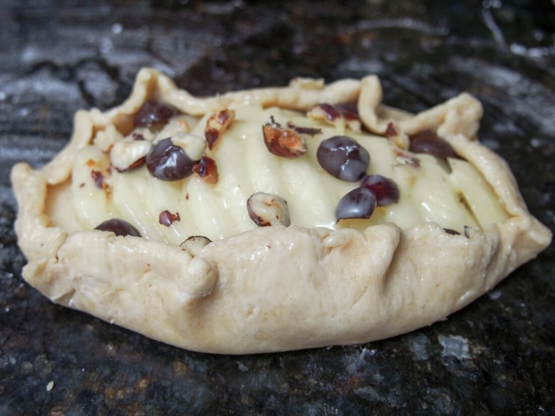 Individual pear galette before being baked