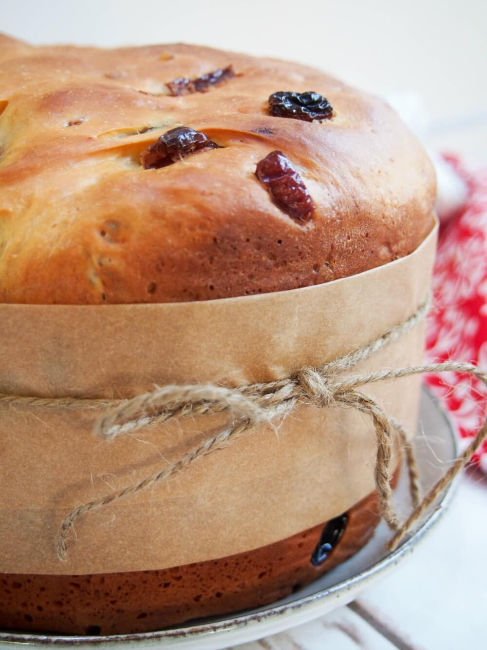 whole Panettone with paper wrapped around tied with string