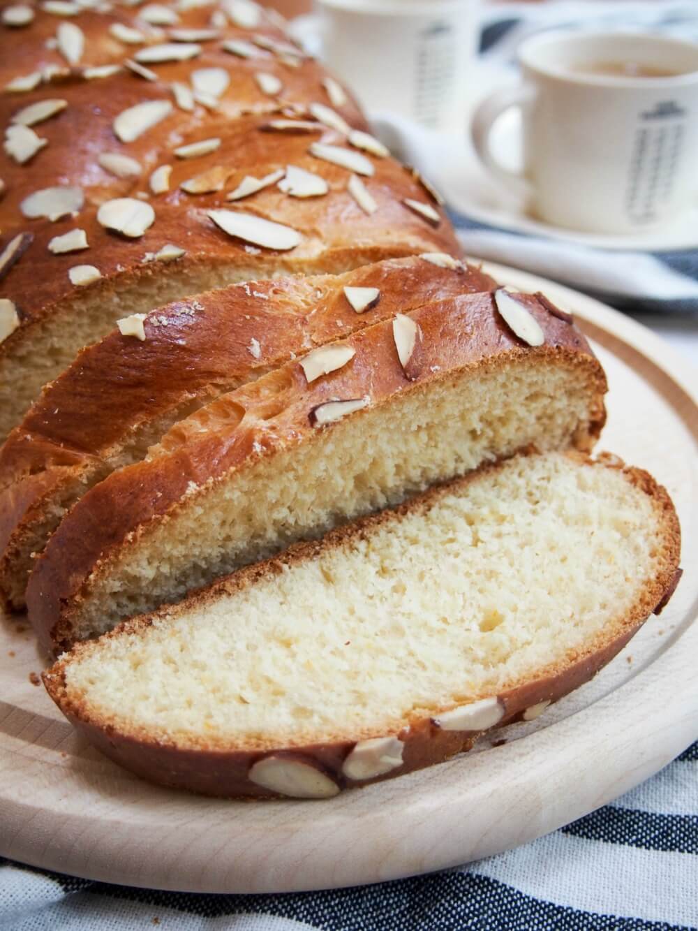 Tsoureki loaf with slices cut at front
