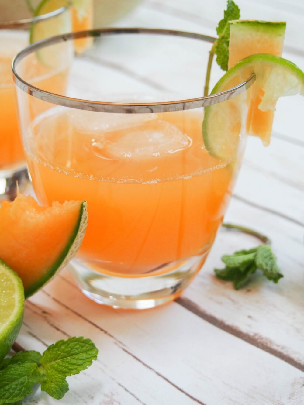 glass of cantaloupe agua fresca close up