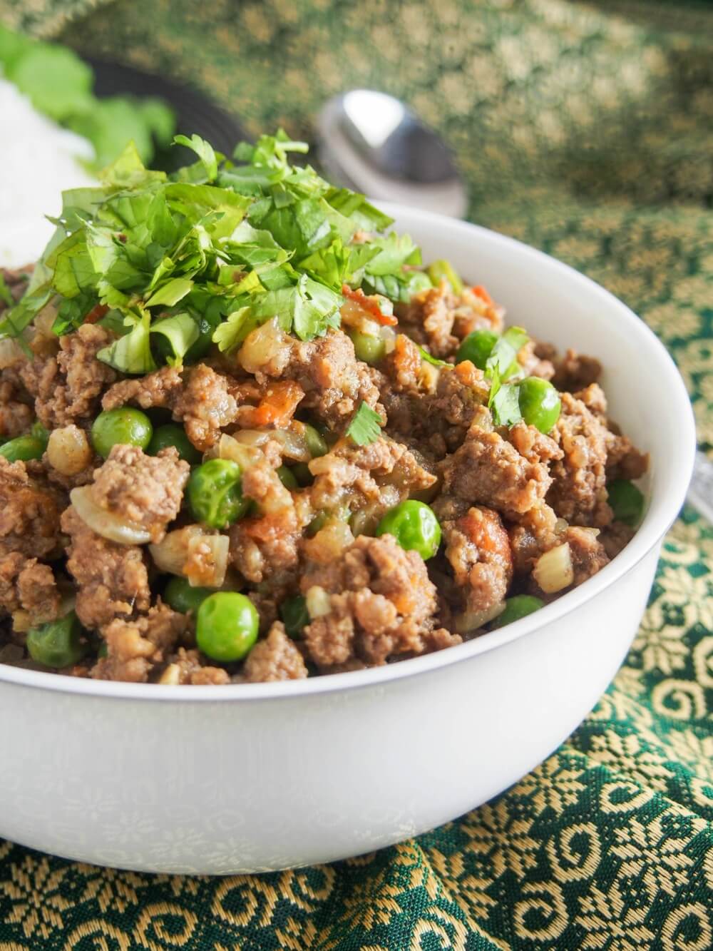 side view of bowl of keema matar