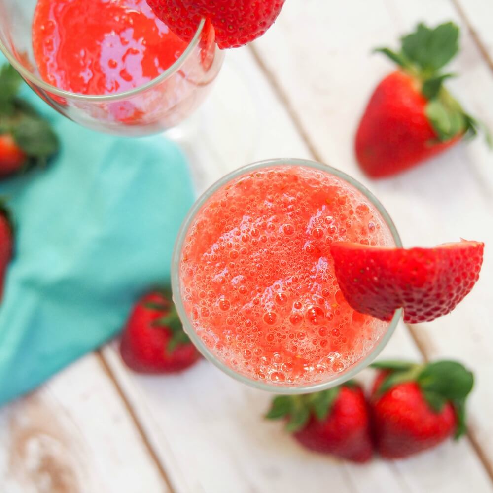 glasses of strawberry bellini from overhead