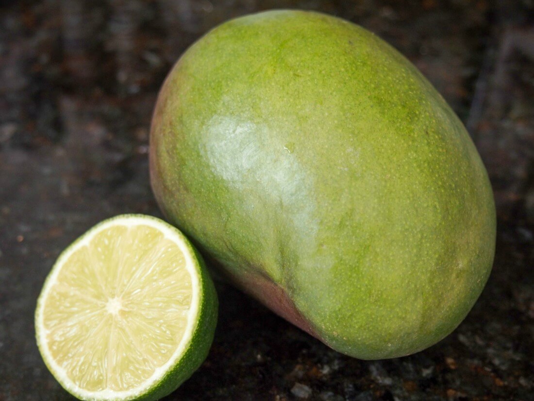 green mango for Cambodian green mango salad green mango with half lime to side