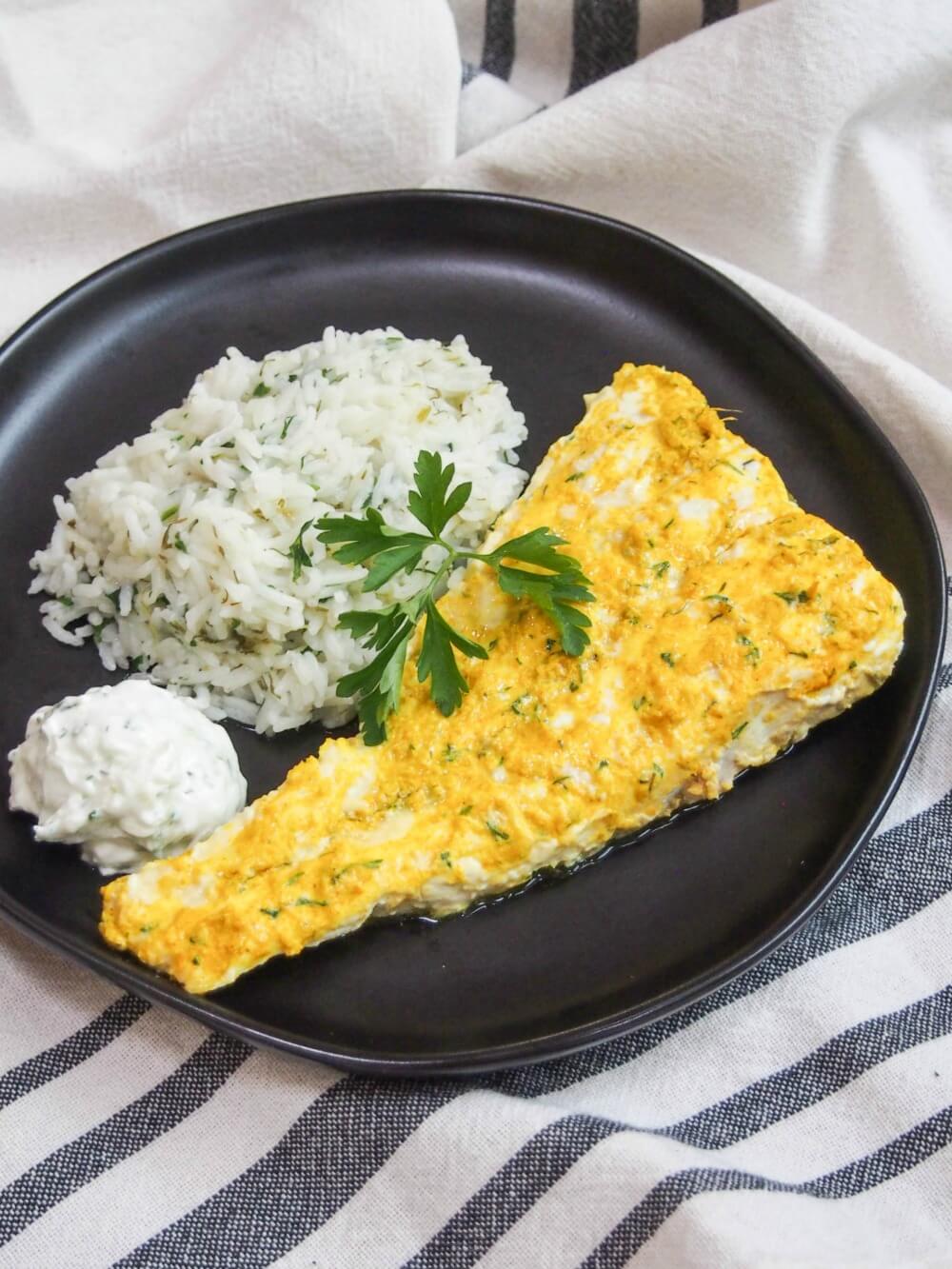 This Persian-style marinated fish is delicately, and deliciously flavored with a lightly spiced lime and yogurt marinade. It's easy to make and a wonderful change from plain old fish. Persian style marinated fish with cacik