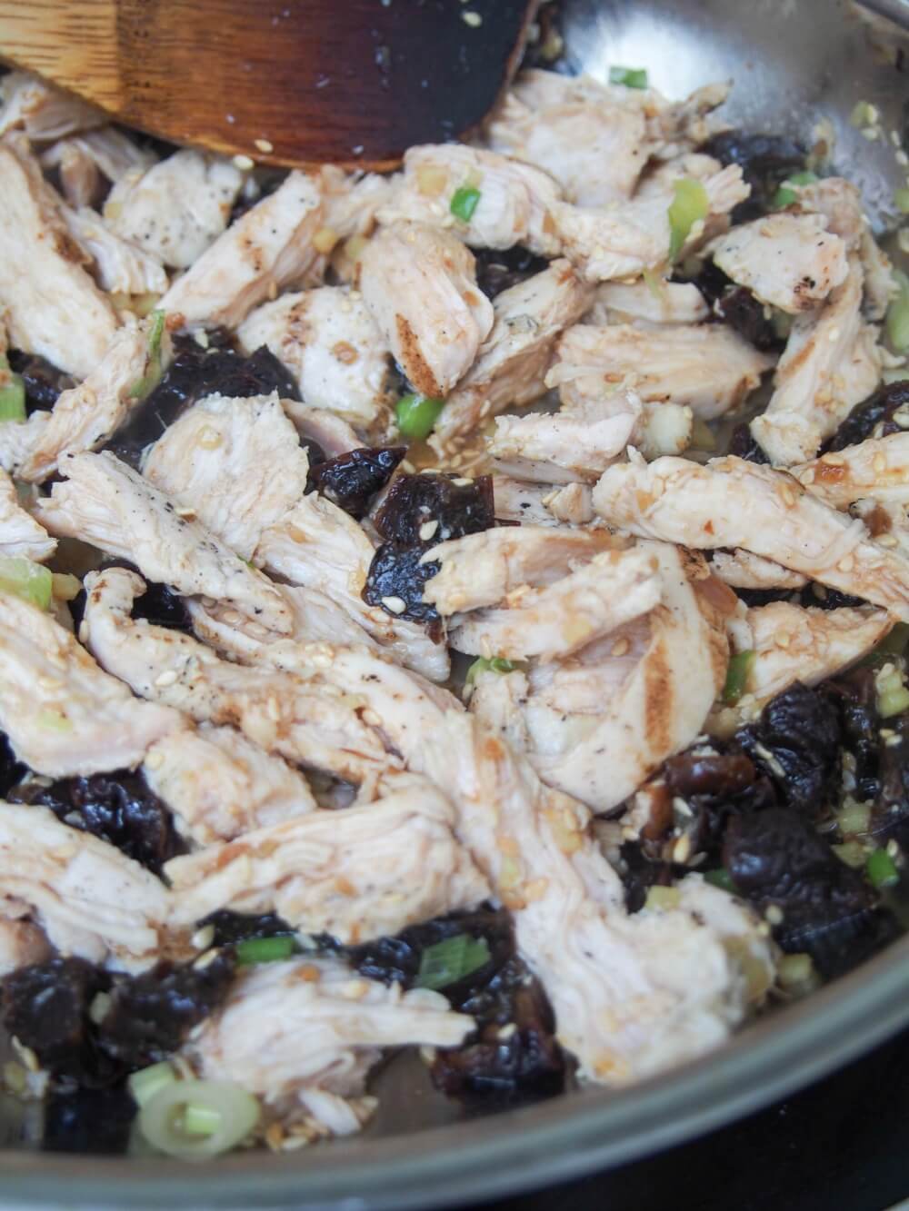 cooking chicken for Chef'd meal kit: Asian chicken and California prunes lettuce wraps