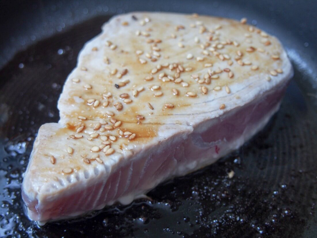 cooking tuna for seared tuna sandwich with Asian sesame slaw