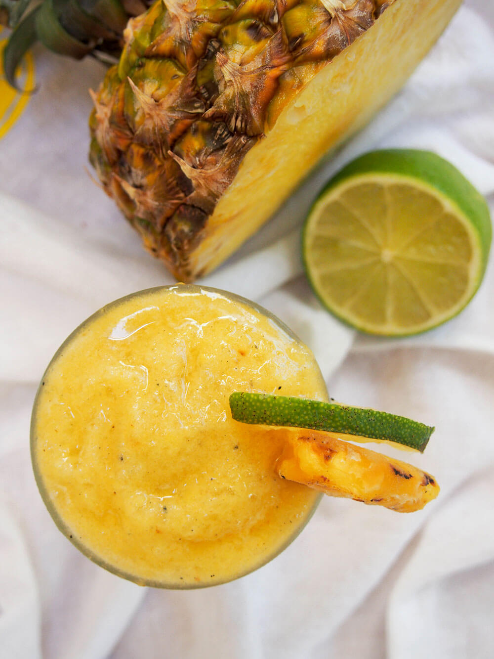 glass of frozen pineapple daiquiri from overhead