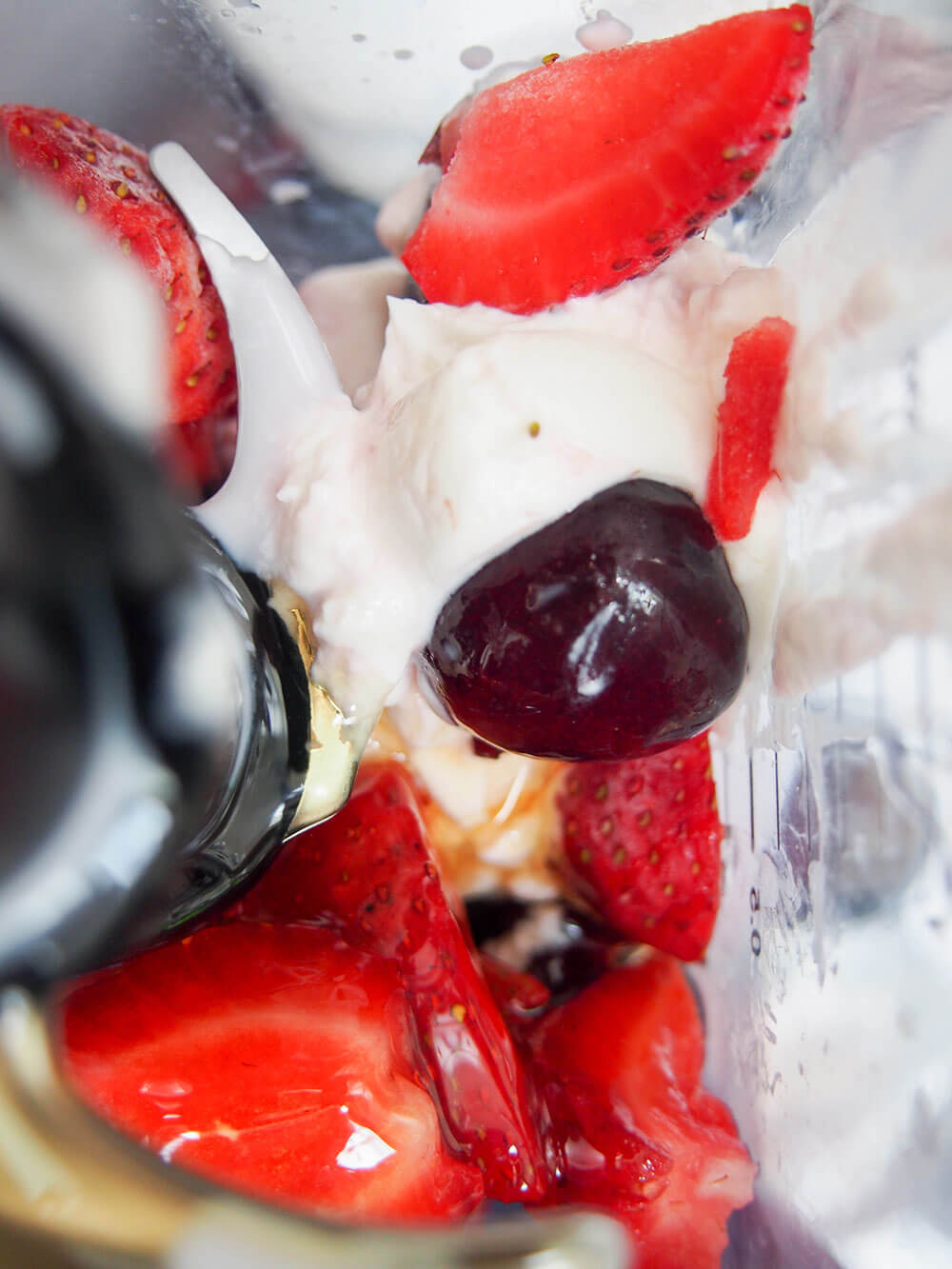 cherry strawberry frozen yogurt ingredients in blender