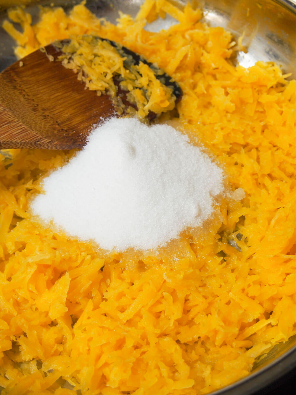 adding sugar to pumpkin