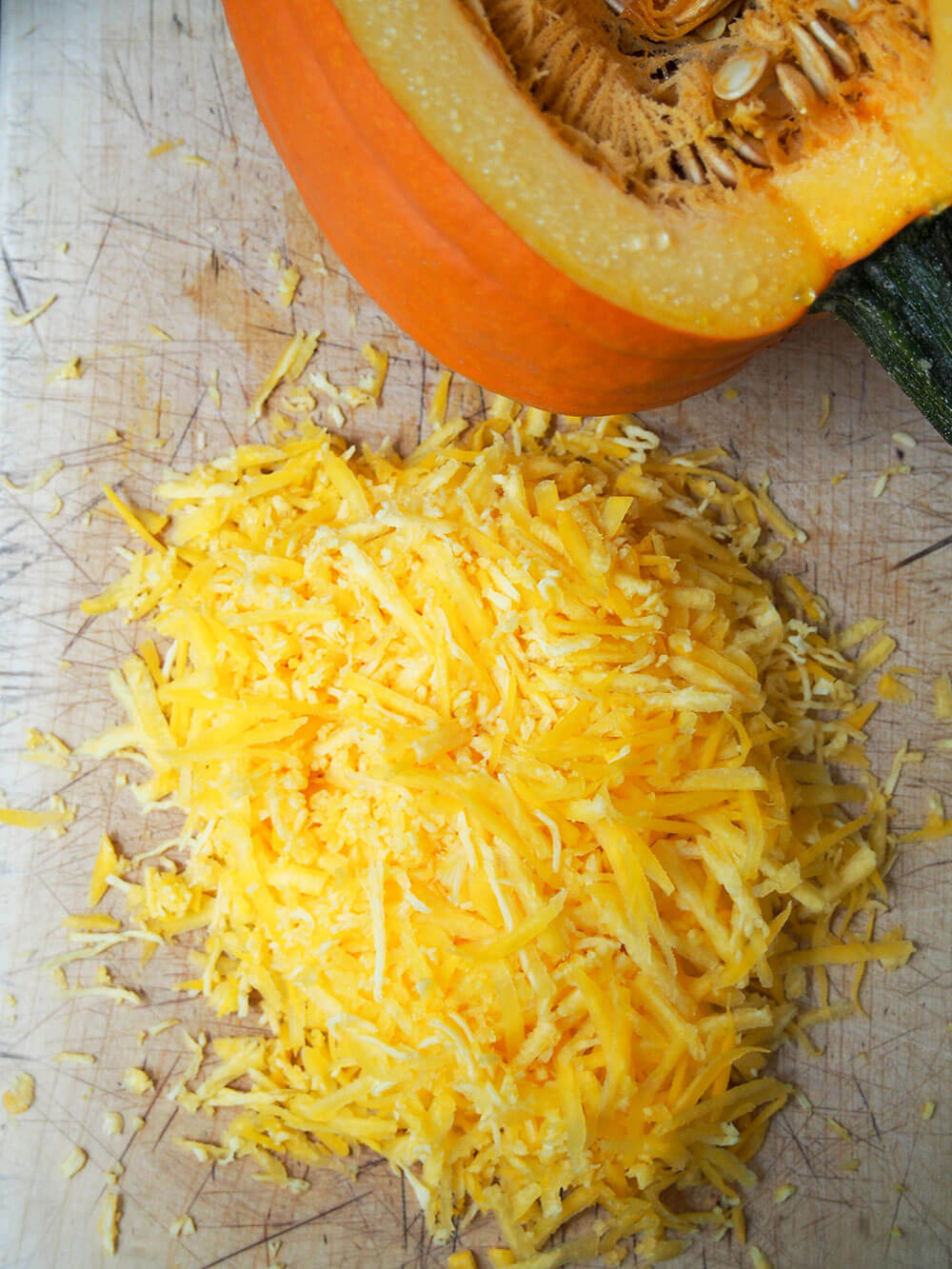 grated pumpkin on chopping board