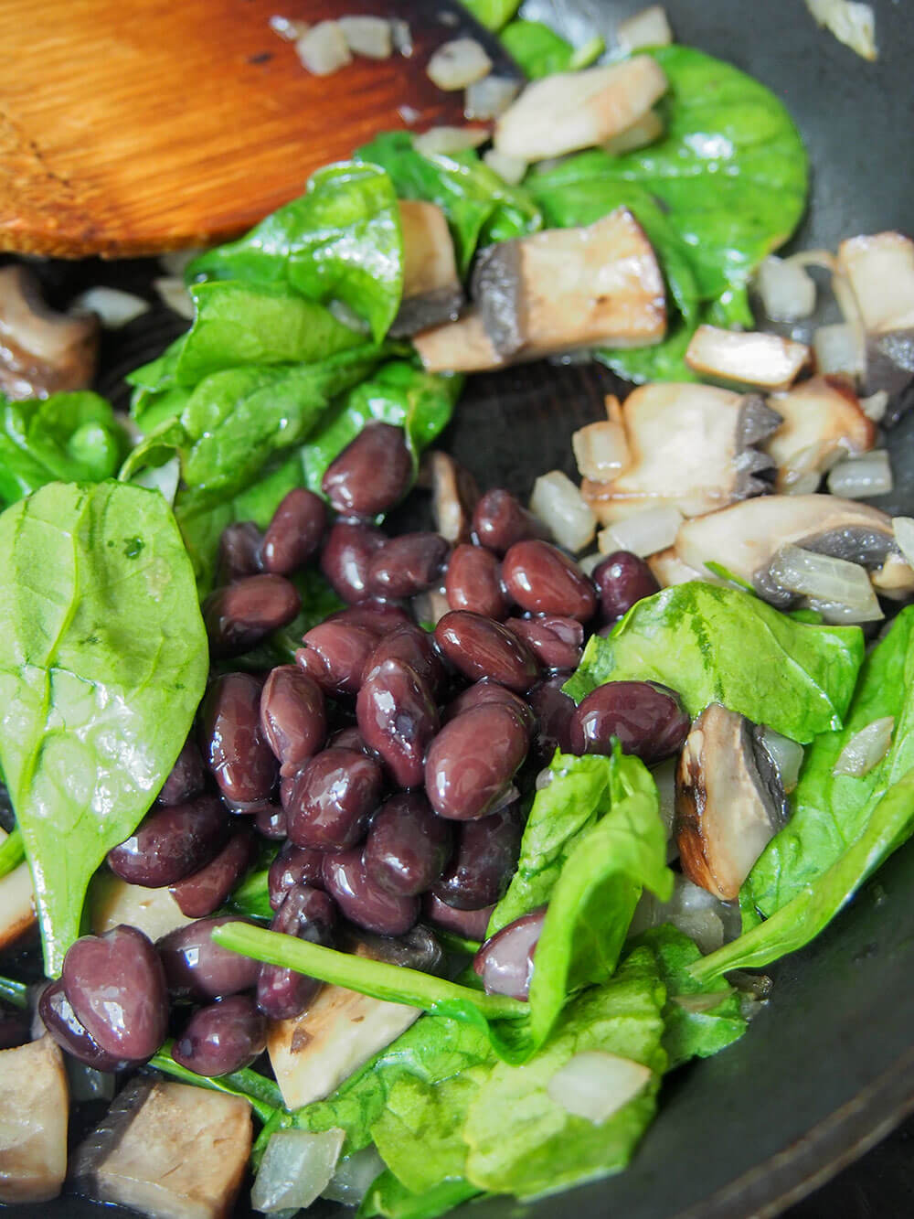 making mushroom quesadillas filling