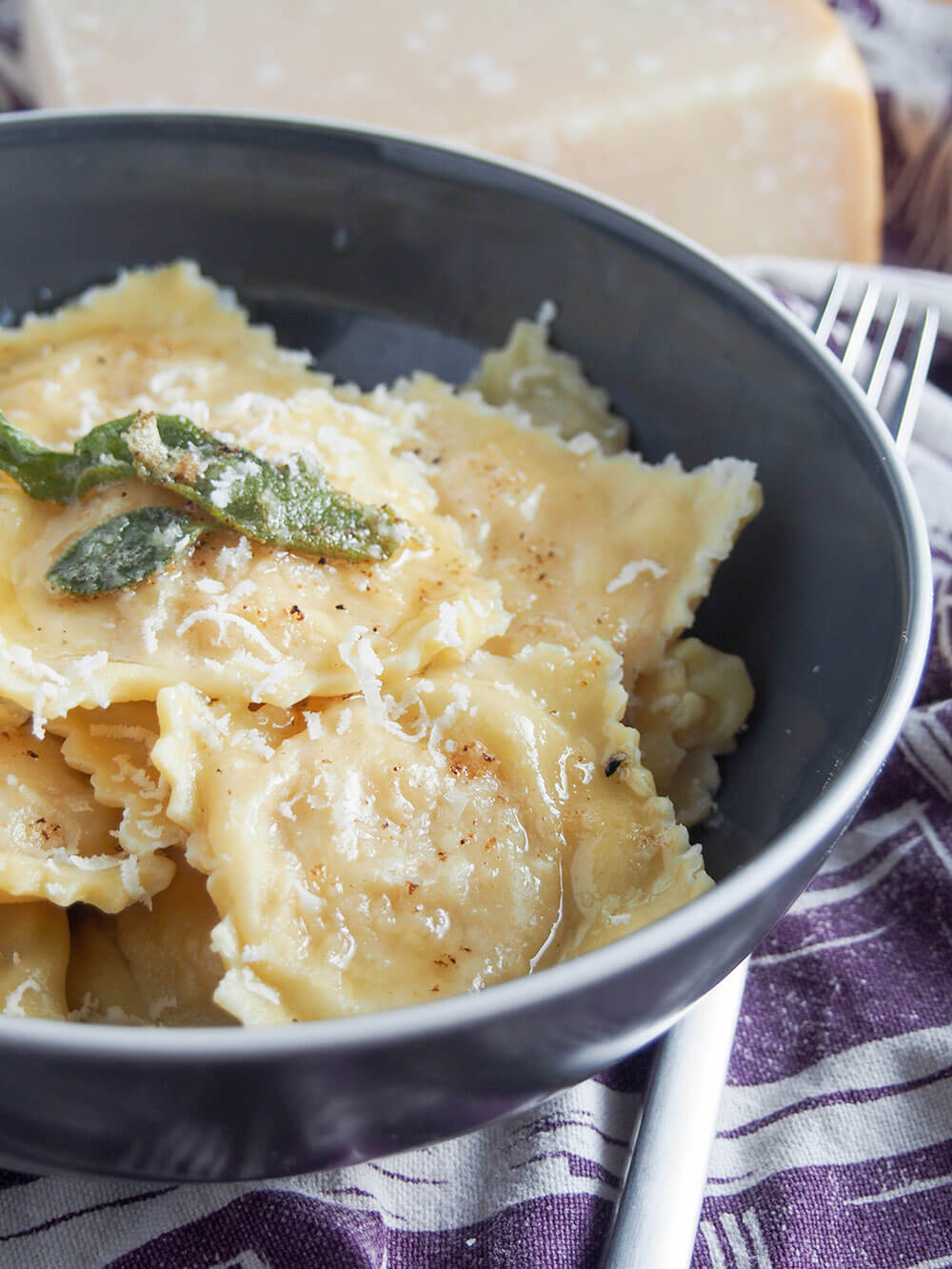 bowl of pumpkin ravioli tortelli di zucca viewed from side
