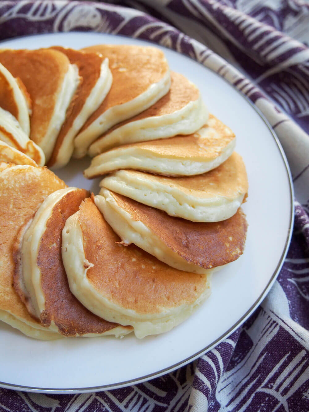 cheese latkes arranged in a ring