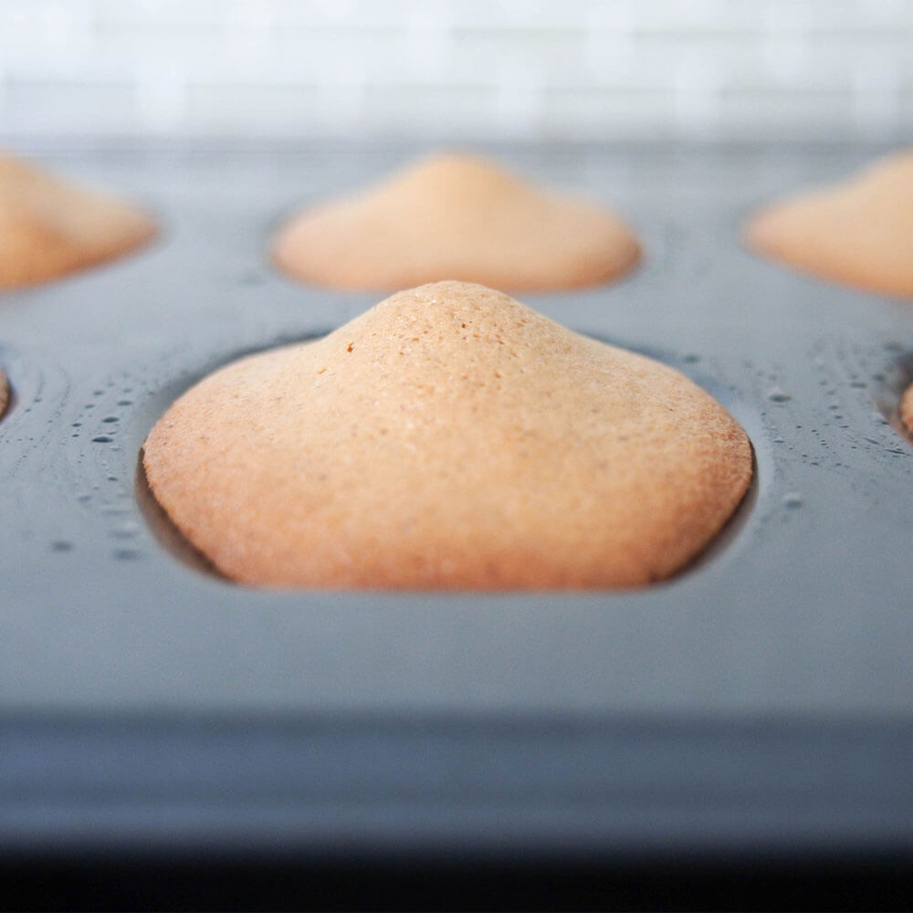 gingerbread madeleines in pan just out oven