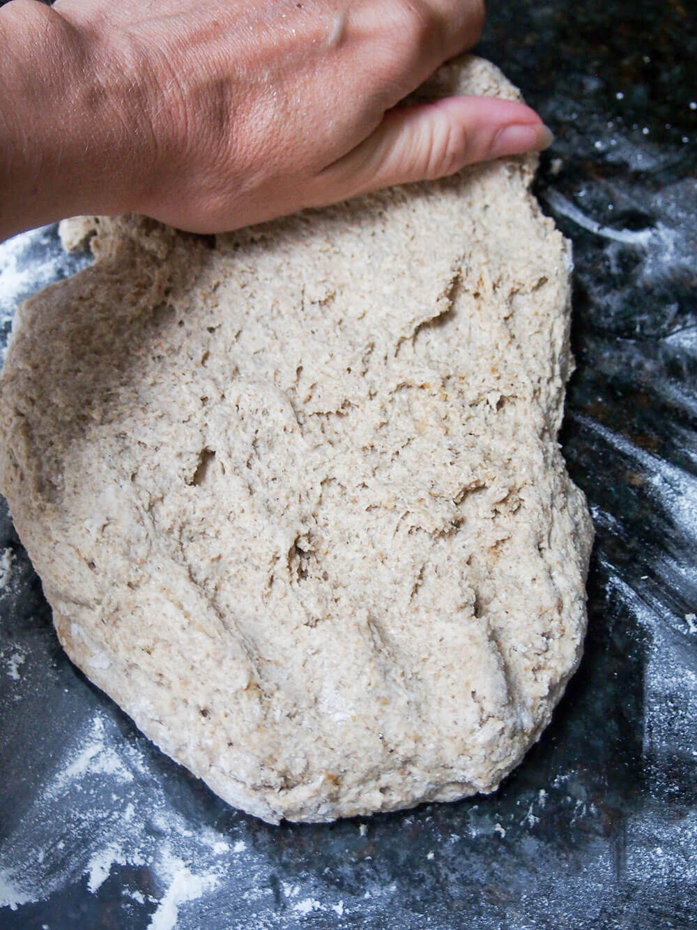 kneading sourdough rye bread