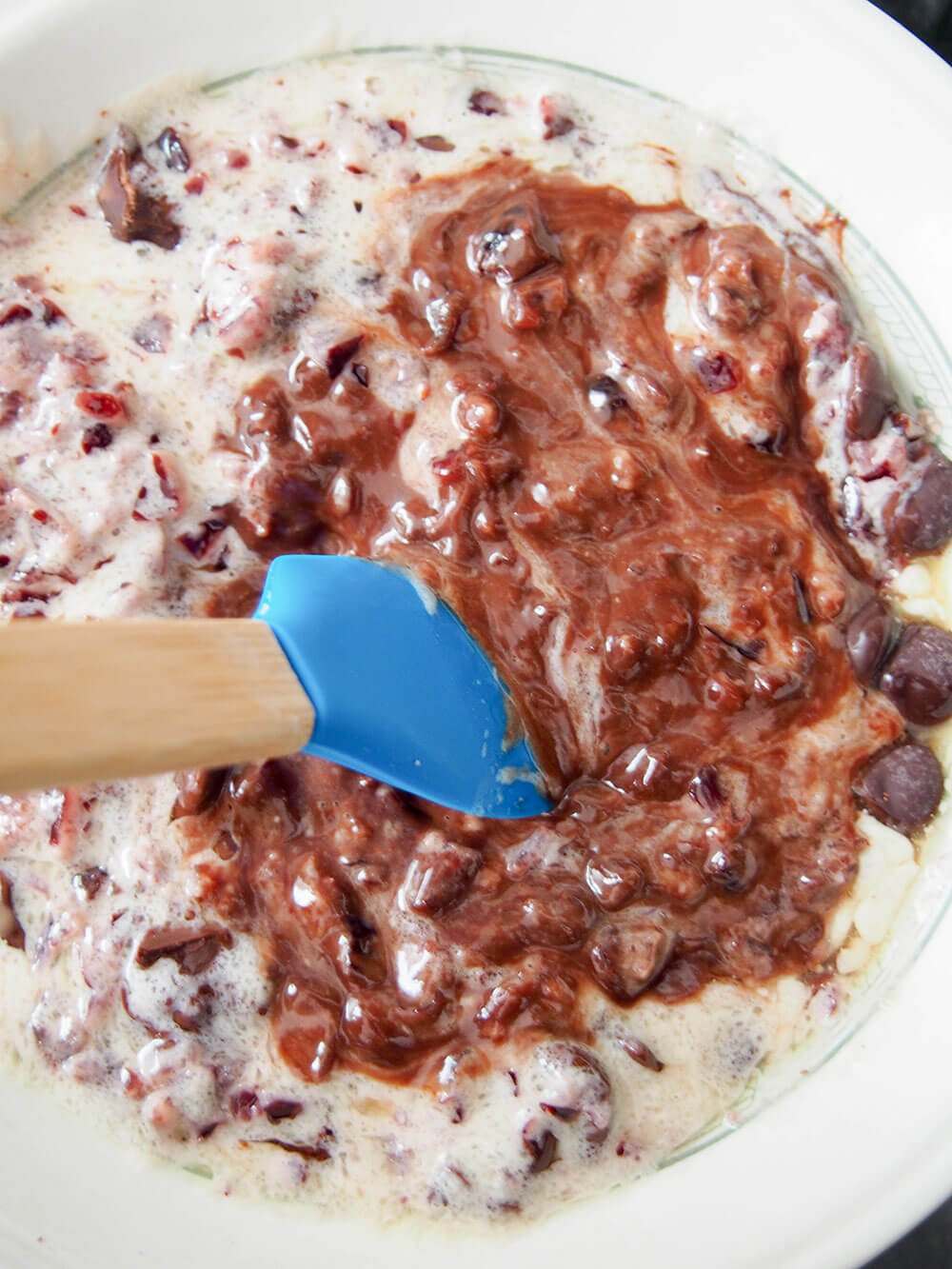 mixing ganache for cranberry truffles