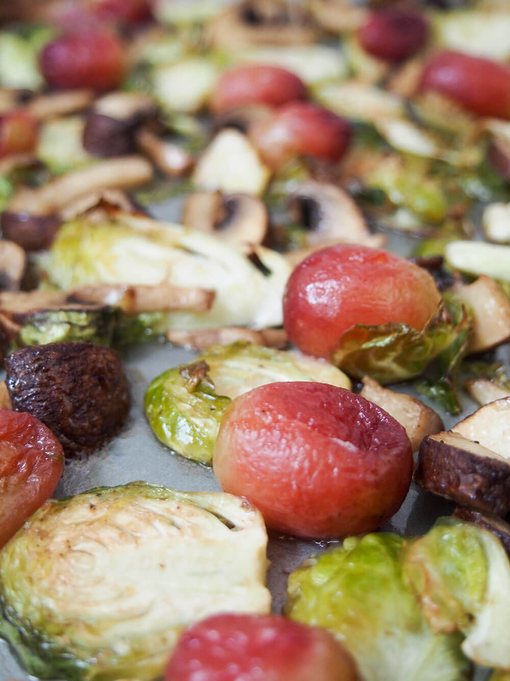 cooked vegetables on baking sheet