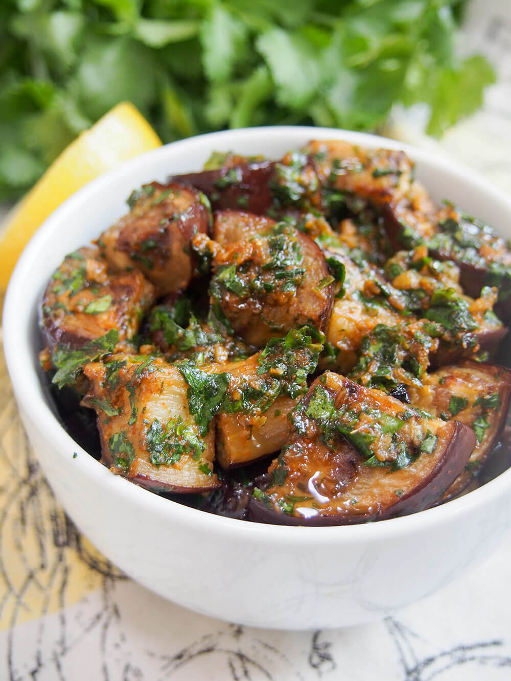 Moroccan eggplant with chermoula in small white bowl