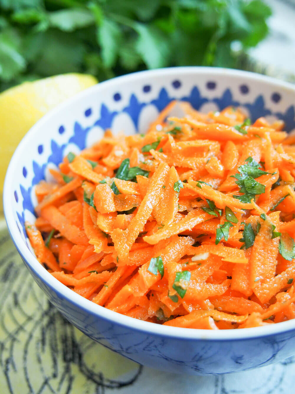 side close up view of bowl of Moroccan raw carrot salad
