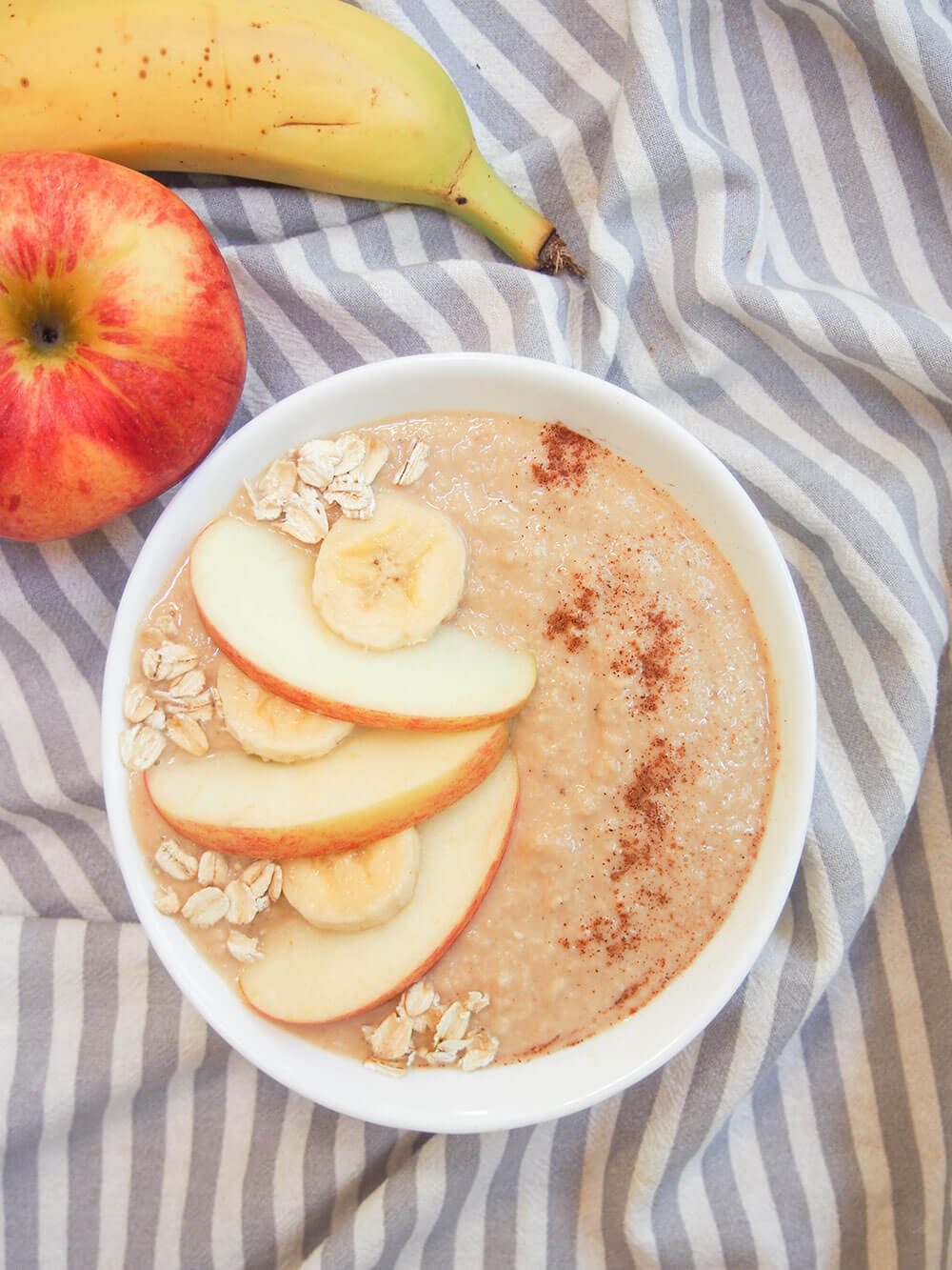 apple banana smoothie as a smoothie bowl apple banana smoothie as smoothie bowl with slices of fruit on top
