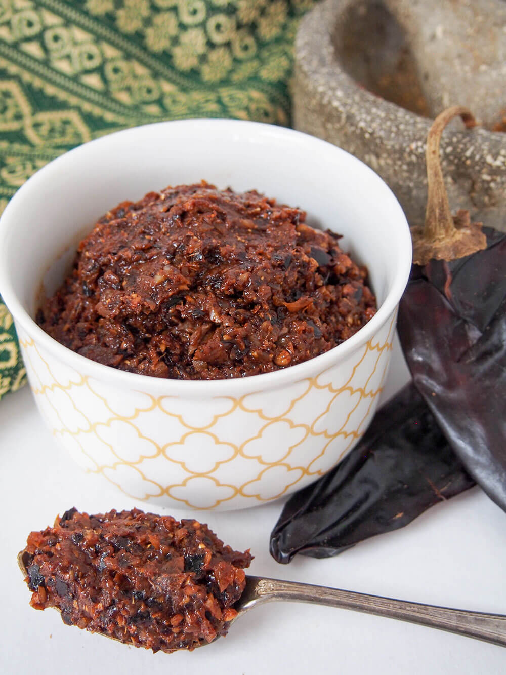 massaman curry paste in bowl and on spoon
