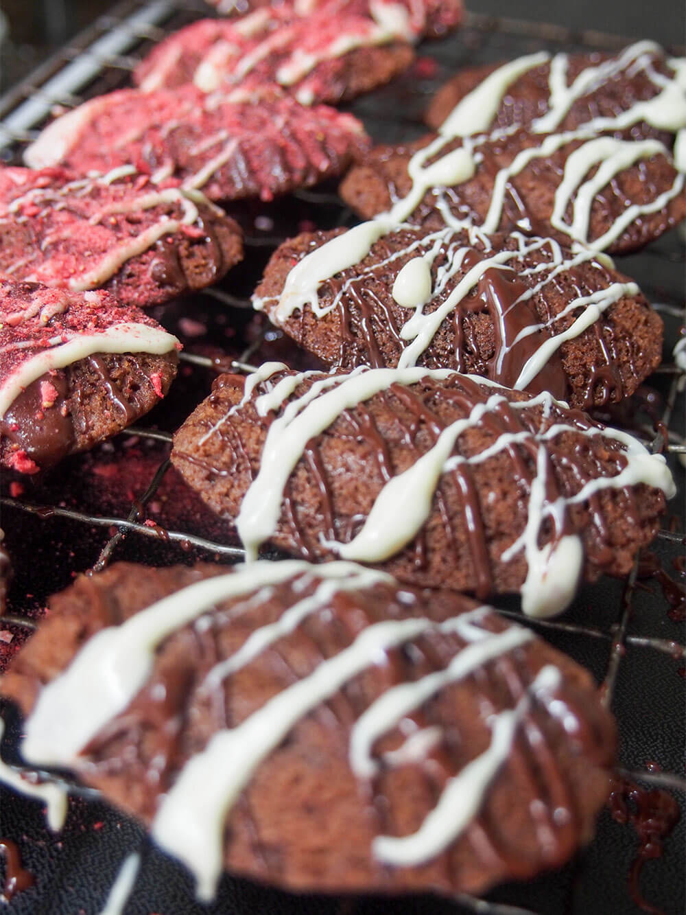 drizzling chocolate on chocolate madeleines