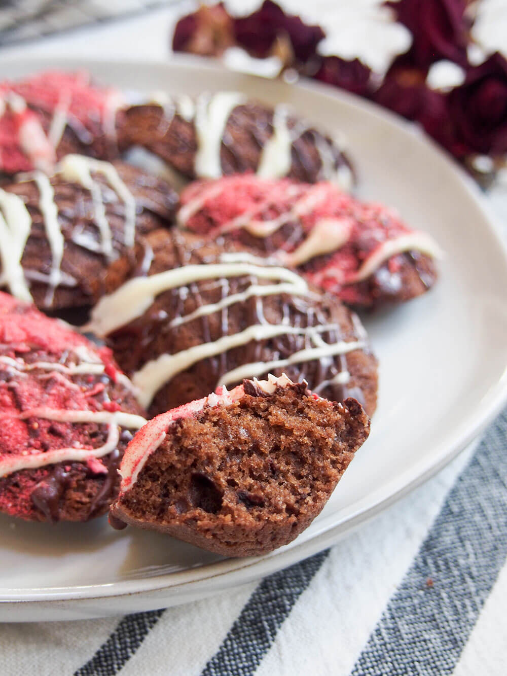 chocolate madeleines with one bitten into
