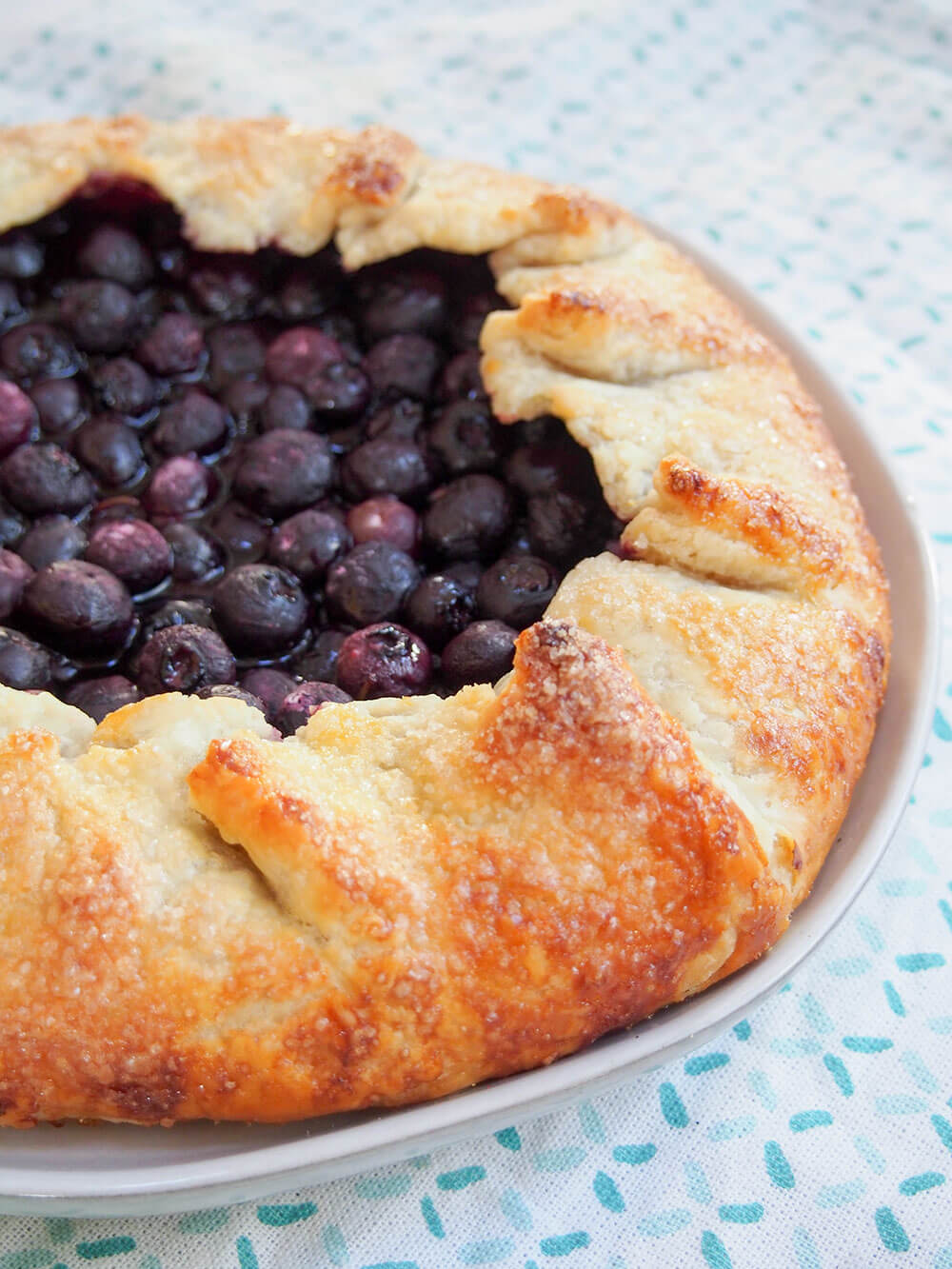blueberry galette side view, showing crisp pastry
