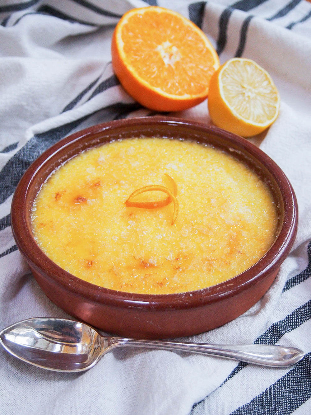 crema Catalana with spoon in front of dish