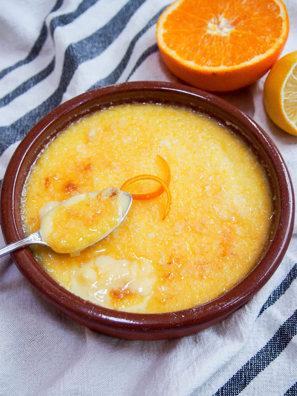 crema Catalana with spoonful sitting on top