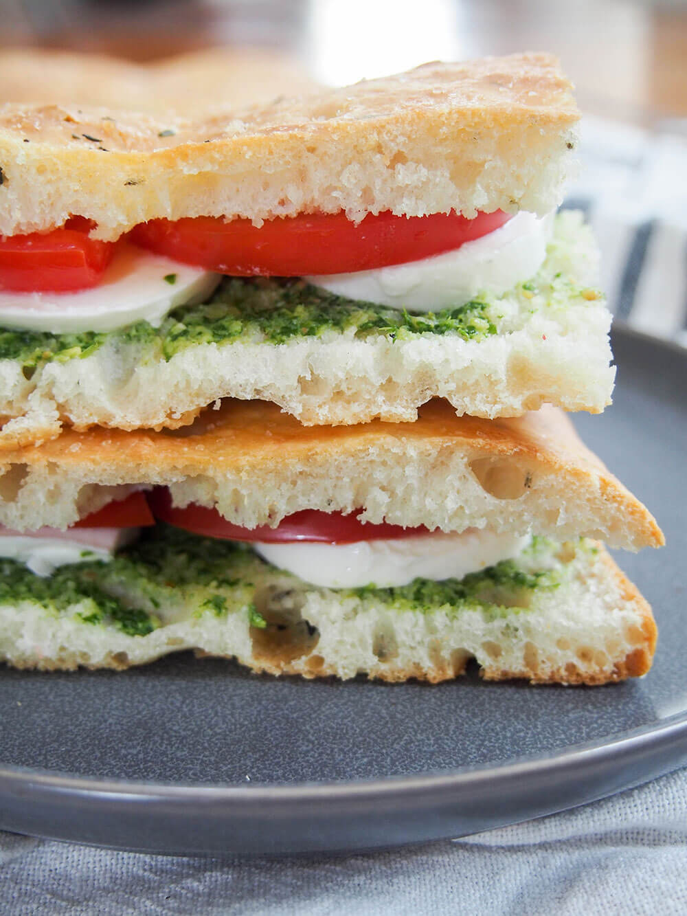 caprese focaccia sandwich close up from side