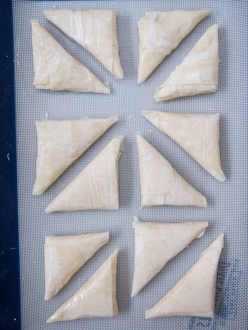 tiropita on baking sheet ready to bake
