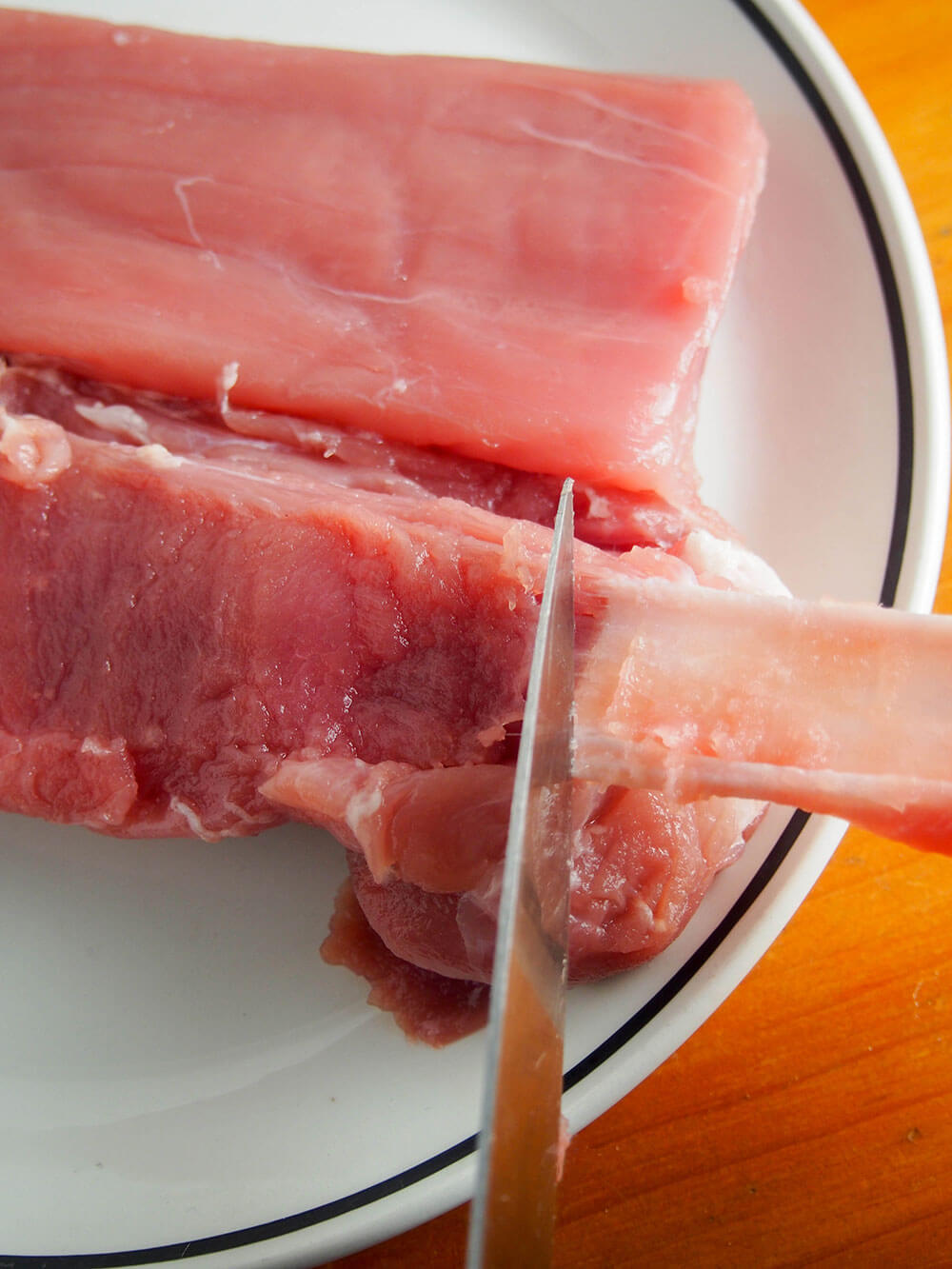 trimming pork tenderloin of sinew