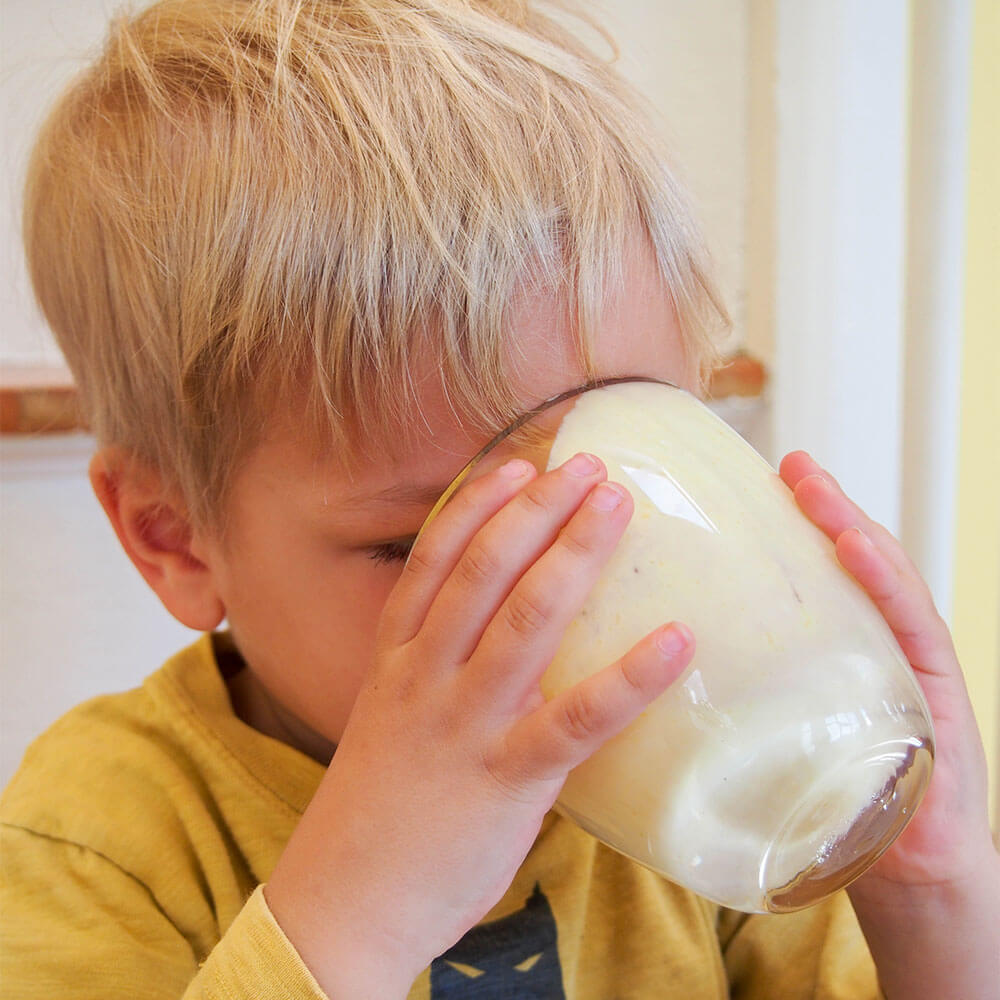 drinking mango lassi