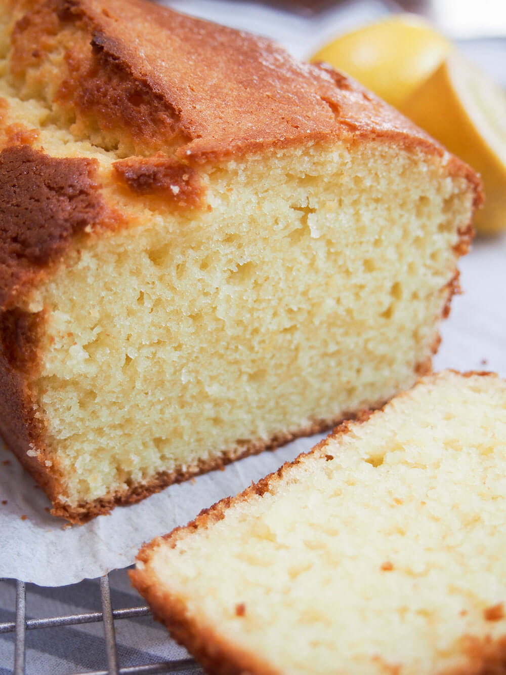 cut end of French lemon yogurt cake close up showing light crumb