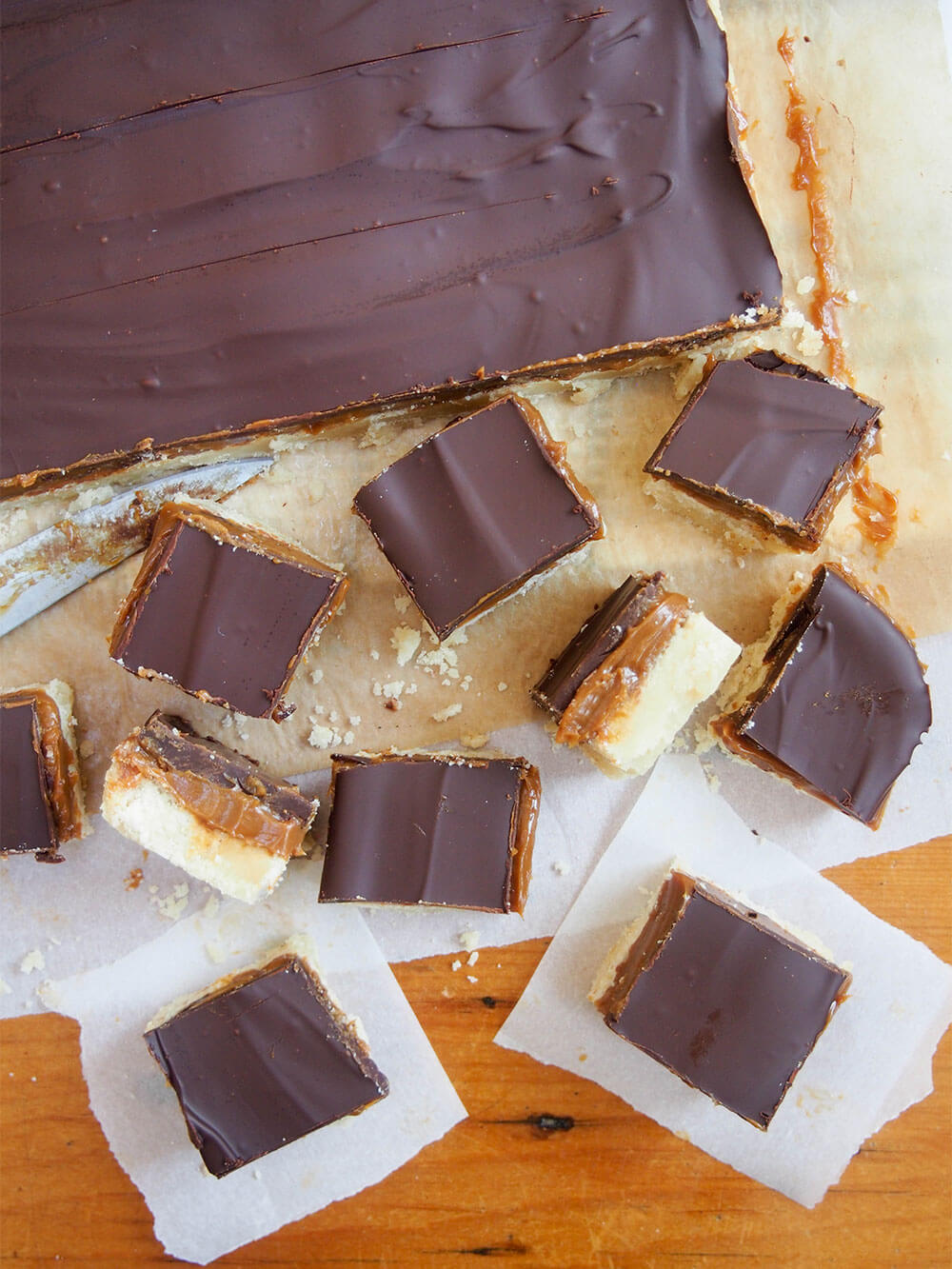 Millionaire's shortbread (caramel shortbread) with slices cut from block to front