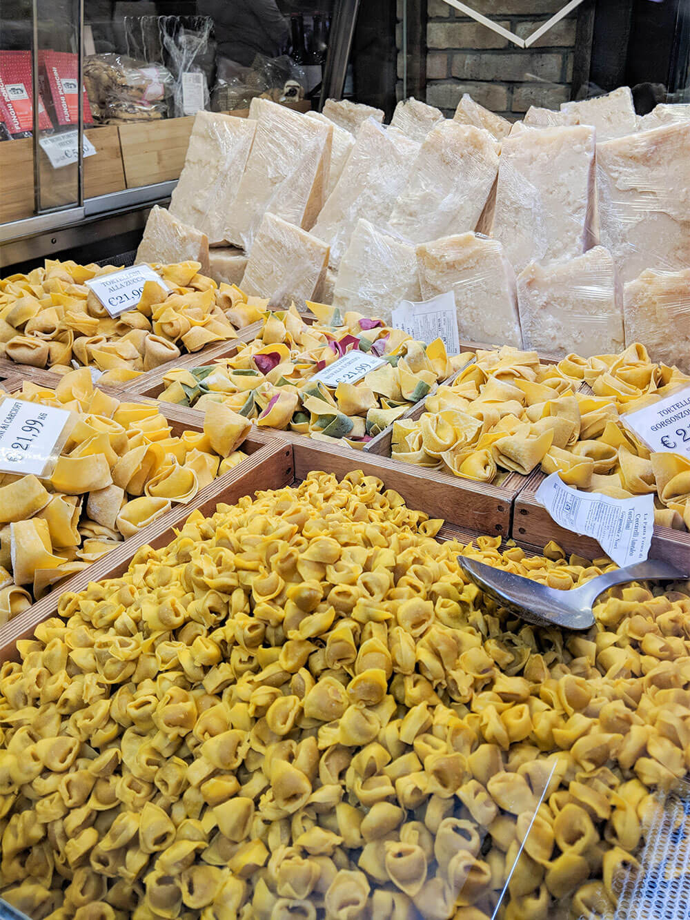 food in Bologna - tortellini and other pasta in market