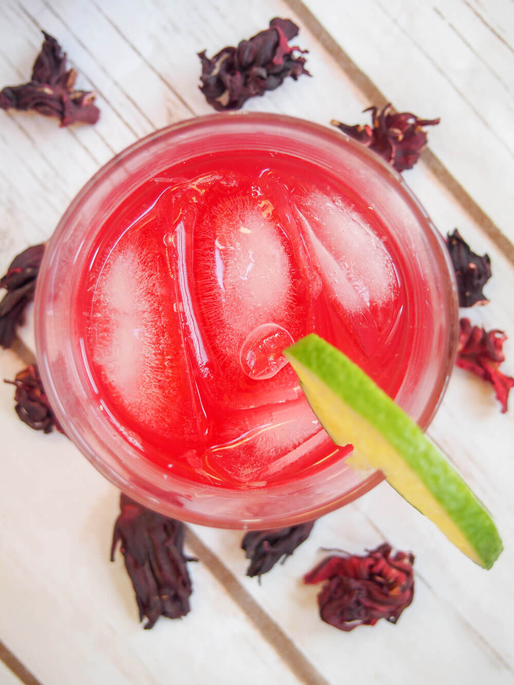 glass of hibiscus mezcal sour from overhead