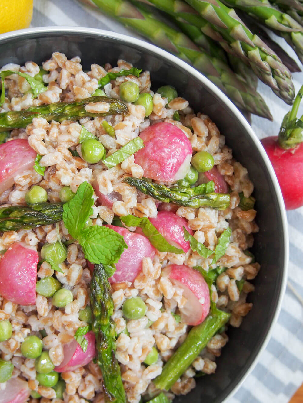 Roasted spring vegetable farro salad close overhead shot