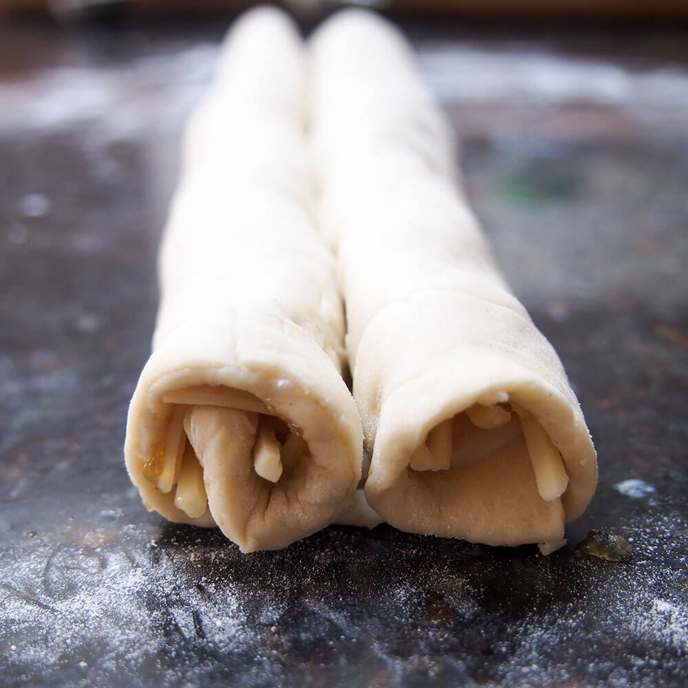 rolled up cheese and fig savory palmiers ready to slice