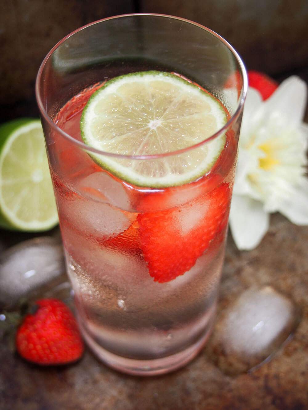 Strawberry St Germain gin and tonic showing slice of lime on top