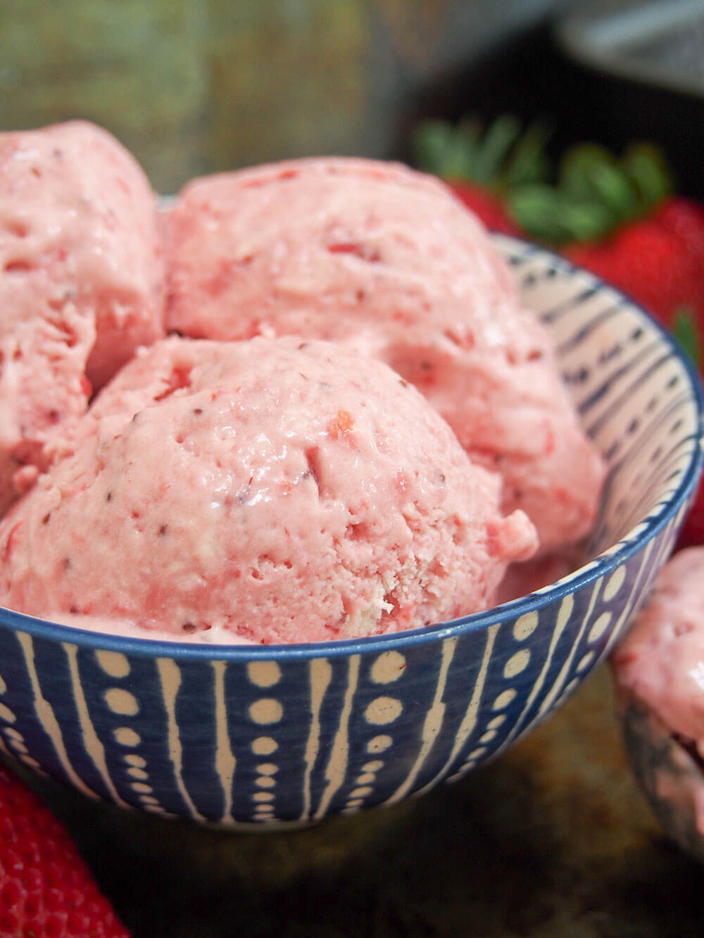 Close up of side of bowl with no churn roasted strawberry ice cream