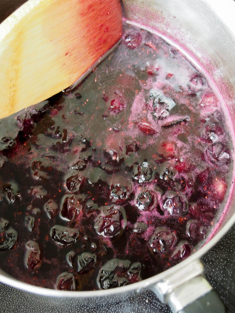 making blueberry simple syrup