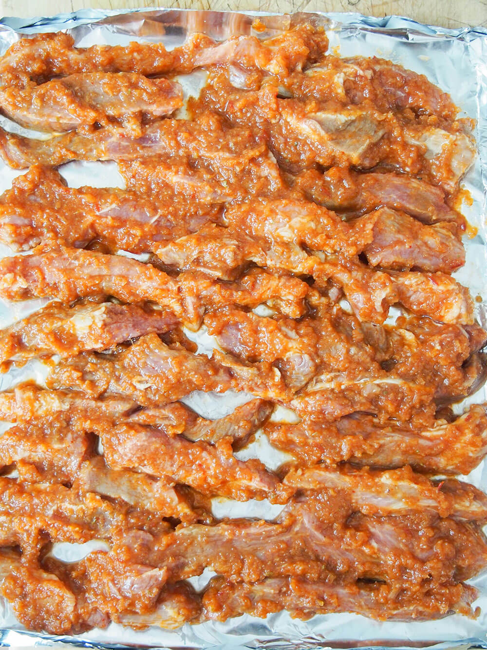 marinated pork slices ready to grill