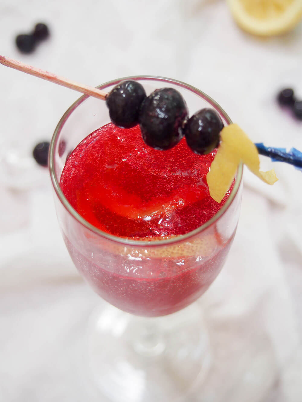Blueberry French 75 cocktail from above