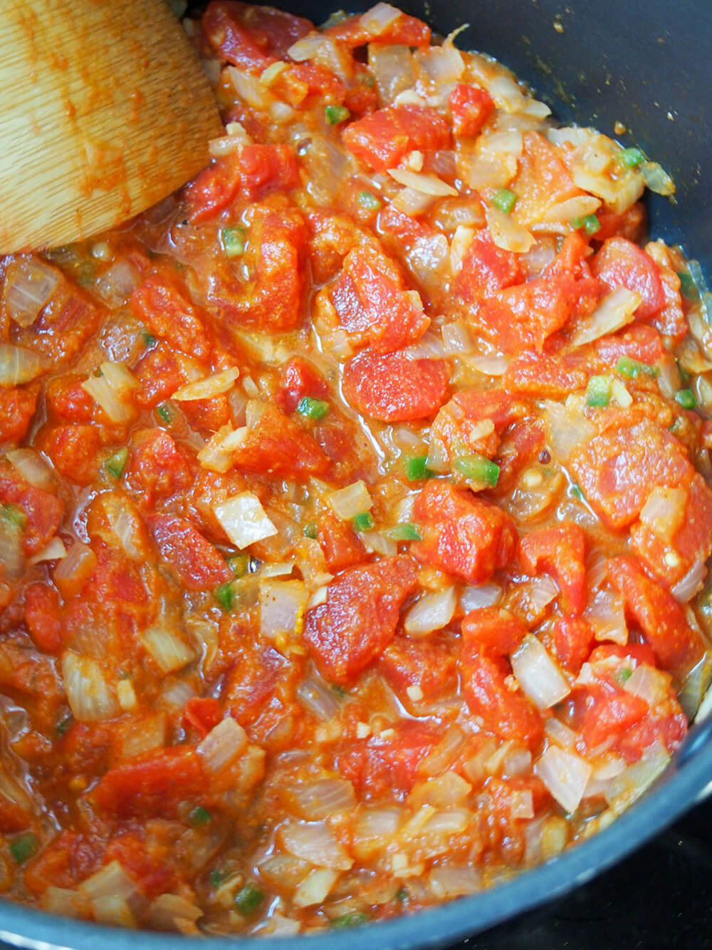 cooking tomato based sauce before adding chickpeas