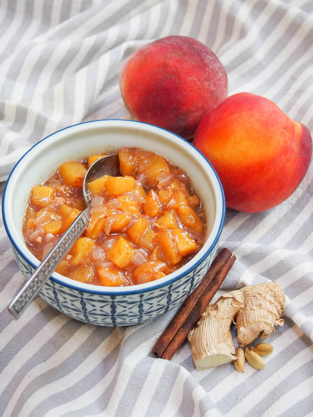 peach chutney with peaches behind